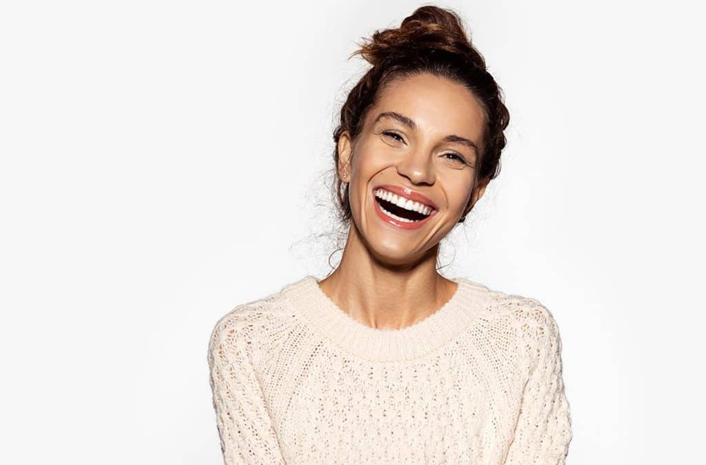 Woman showing off her beautiful smile