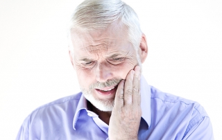 Senior man portrait toothache