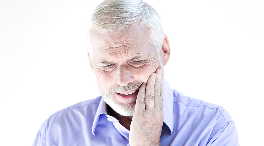 Senior man portrait toothache